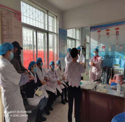 图一 带黑色帽子和黑色口罩为文法学院学生第一党支部预备党员陈辉铭.jpg